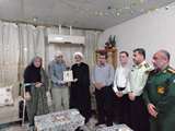 دیدار مدیر کل بنیاد شهید بوشهر با خانواده شهید اغتشاشات دی ماه ایمان پورفرجام در شهر برازجان 